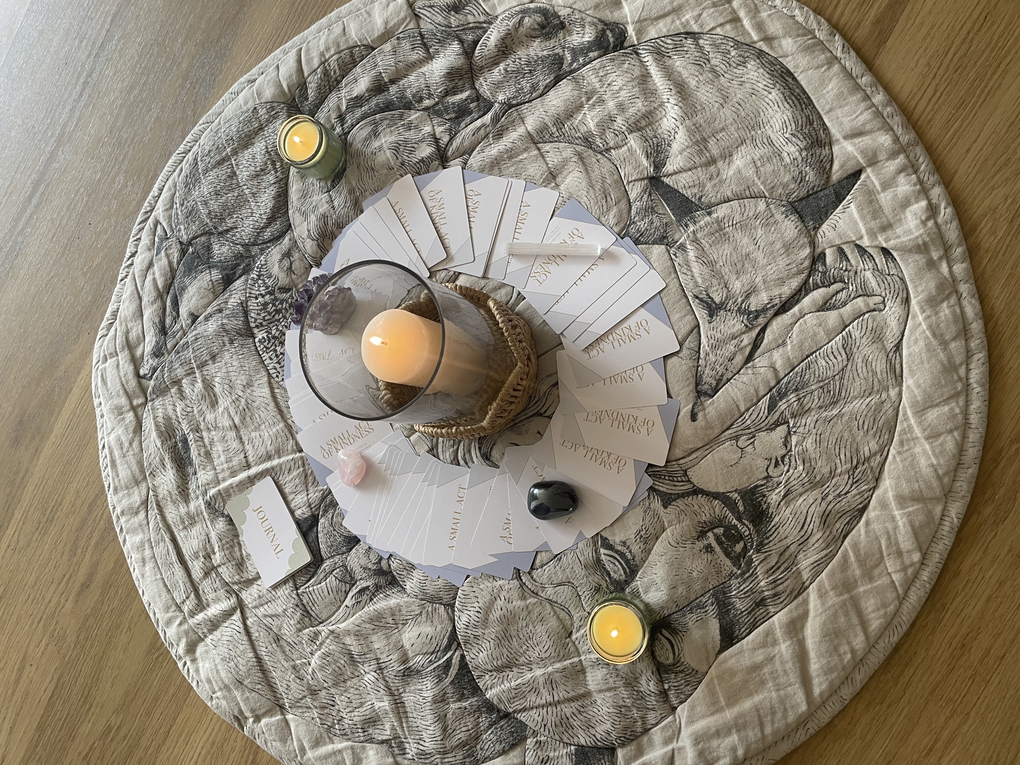 Sunday Share sharing circle, candle and cards laid on the mat